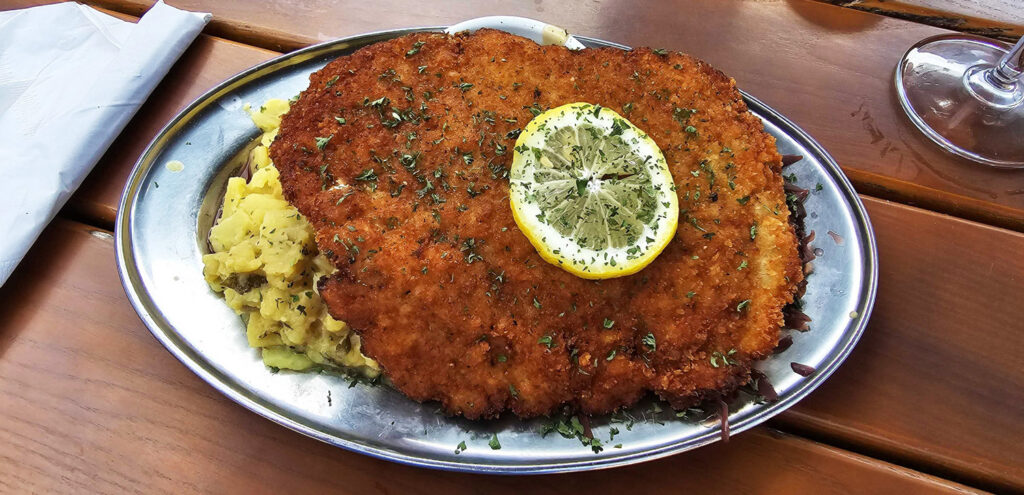 Pork schnitzel with potato salad and red cabbage at Urban German Wursthaus in St Johns