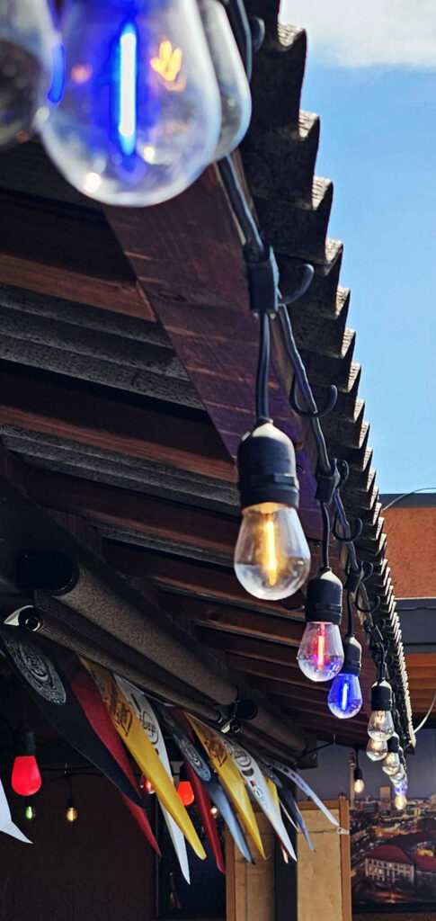Fun lights strung on the outdoor deck at Urban German Wursthaus in St Johns