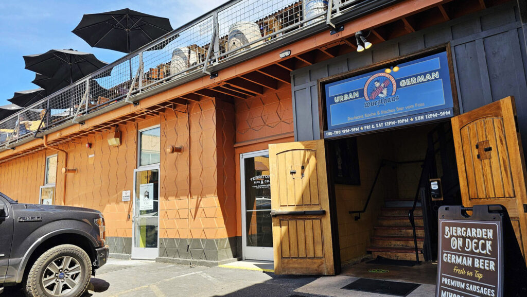 The entrance and view of the outdoor "rooftop" dining at Urban German Wursthaus in St Johns